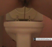 A girl has a soft, runny dump as she straddles a toilet.